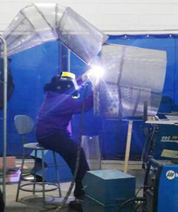 Jessica Wordsworth welding head to torso