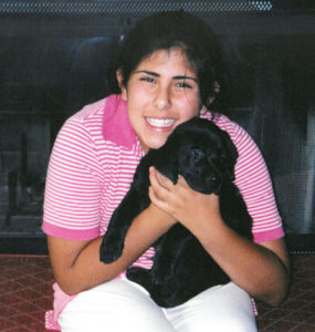 Gunner as a puppy with Jessica Wordsworth