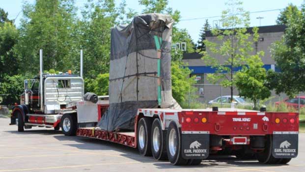 flat bed truck with dual basket loaded for shipping