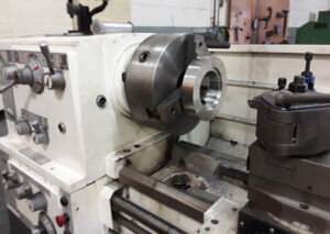 custom bleed ring on lathe at Sure Flow