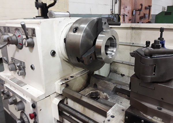 custom bleed ring on lathe at Sure Flow