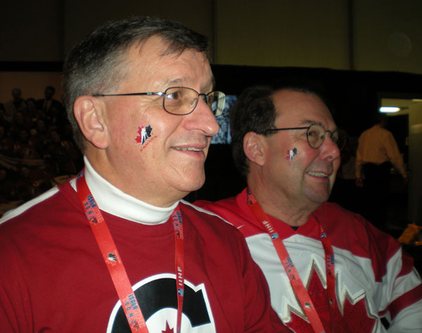 George and John cheering hockey